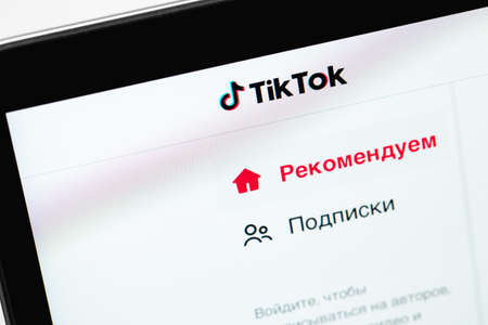 TikTok logo official russian website on the screen laptop closeup. TikTok is app to create and share videos. Moscow, Russia - November 18, 2020のeditorial素材