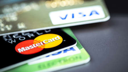 Visa, Visa Electron, Master Card - International payment systems, bank / credit cards closeup. Moscow, Russia - September 25, 2020のeditorial素材