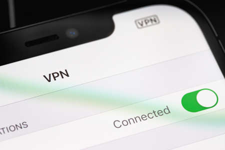 Apple iPhone with VPN Settings on screen, macro. Apple Inc. is an American multinational technology company. Moscow, Russia - January 15, 2021のeditorial素材
