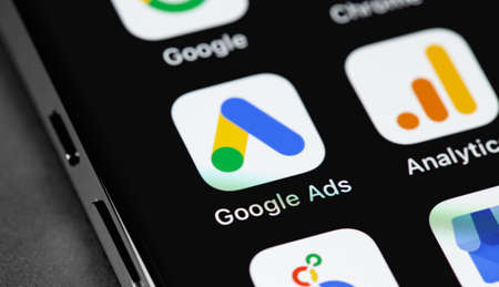 Google Ads (AdWords), Analytics mobile apps on display smartphone, iPhone, macro. Google Ads is a contextual service, mainly search advertising from Google. Moscow, Russia - January 15, 2021のeditorial素材