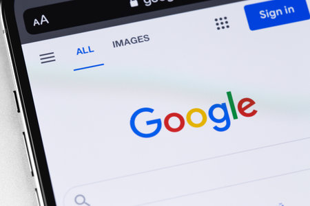Google homepage, startup page on screen smartphone closeup. Google is an American multinational corporation. Moscow, Russia - January 20, 2021のeditorial素材