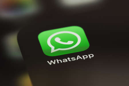 WhatsApp mobile icon app on screen smartphone iPhone closeup. WhatsApp is a popular free instant text messaging system for mobile and other platforms. Moscow, Russia - June 14, 2021のeditorial素材