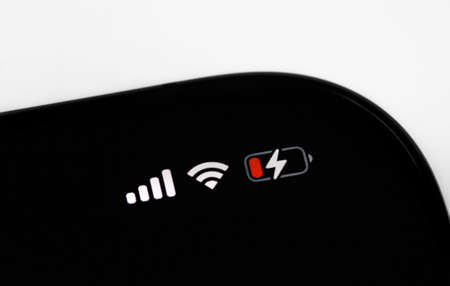 smartphone iPhone with status bar macro Battery health icon, interface on screen iPhone. Apple is a multinational technology company. Moscow, Russia - April 23, 2021のeditorial素材