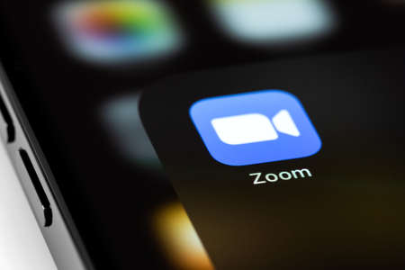 Zoom mobile icon app on screen smartphone iPhone macro. Zoom Video Communications is a company that provides remote conferencing services. Moscow, Russia - June 15, 2021のeditorial素材