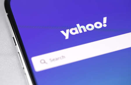 Yahoo Search mobile app on screen smartphone iPhone closeup, Yahoo start page. Yahoo is a tech company, leader in search engine service and information technology web portals. Moscow, Russia - July 28, 2021のeditorial素材