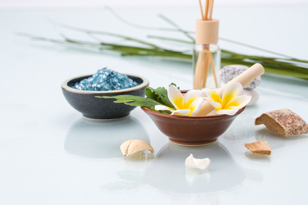 Organic Spa concept with Mortar and Pestle, Flowers, leaf, Scented, and saltの写真素材