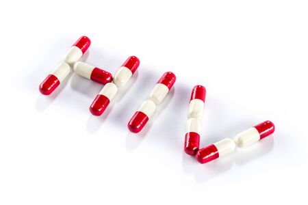 red with white capsule in HIV WORLD, AIDS medicationの写真素材