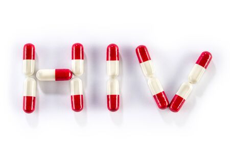 red with white capsule in HIV WORLD, AIDS medicationの写真素材