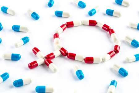red capsule and blue capsule in Gender Symbol, women's Health Sexual Issuesの写真素材