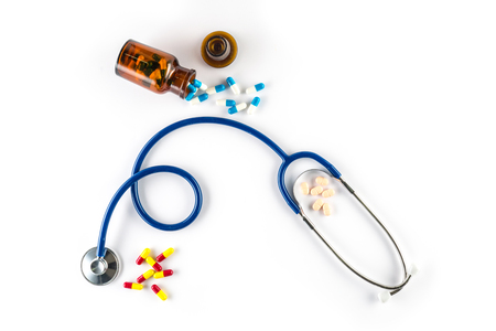 capsule in bottle with Stethoscope and pill cardiology treatの写真素材