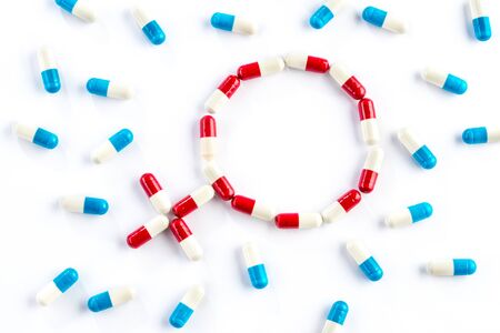 red capsule and blue capsule in Gender Symbol, women's Health Sexual Issuesの写真素材