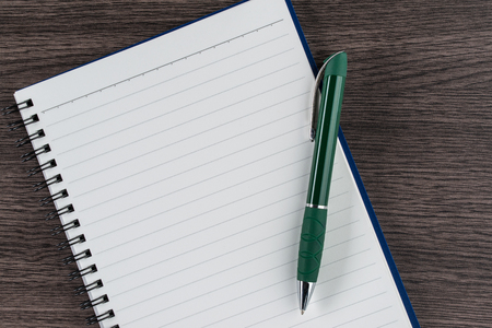 Lined notebook and pen, checklist  memo reminder memorandum diaryの写真素材