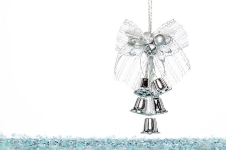 Luxury Silver jingle Bells with Snow, hanging Decoration, isolated on whiteの写真素材