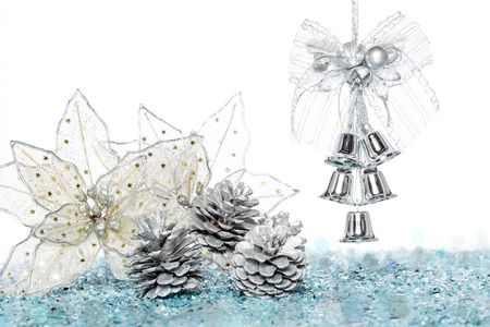 Luxury Silver jingle Bells with Snow and Pine Cone, hanging Decoration, isolated on whiteの写真素材
