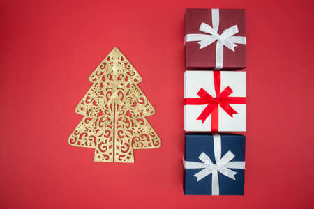 Gift box for Christmas day sale and shopping boxing day on red backgroundの写真素材