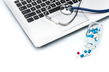 Medical Research, stethoscope  on laptop keyboard with Capsule, doctor workplaceの写真素材