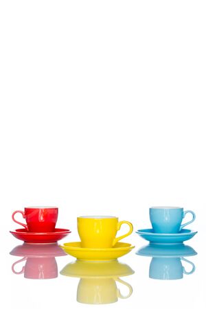 enjoy multiple colorful coffee cup mug on reflection table white  backgroundの写真素材