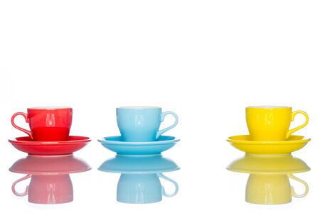 enjoy multiple colorful coffee cup mug on reflection table white  backgroundの写真素材