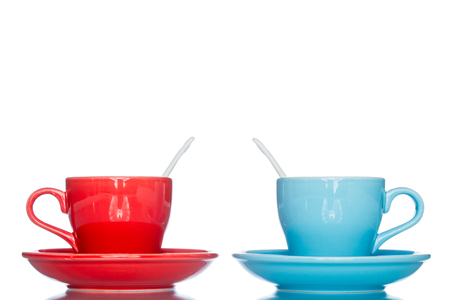 enjoy multiple colorful coffee cup mug on reflection table white  backgroundの写真素材