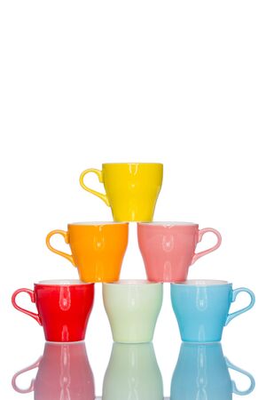 enjoy multiple colorful coffee cup mug on reflection table white  backgroundの写真素材