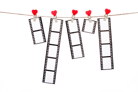 heart  shape clip on a clothesline , hanging Negatives, love movie memoryの写真素材