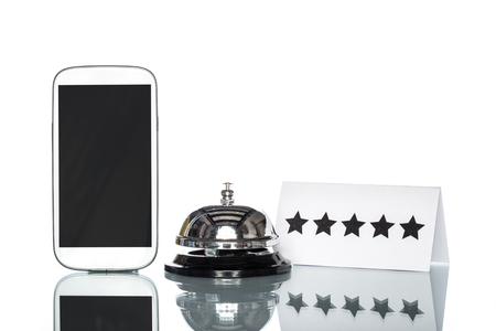 cell phone and Service bell on white background, Five Stars Servicesの写真素材