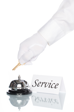 Service bell on the Check in desk with white backgroundの写真素材