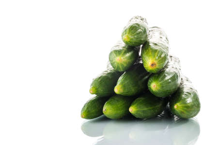 Fresh cucumber vegetable close up on white backgroundの写真素材