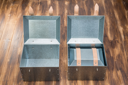 three metal tool box on wooden table, Studio Shotの写真素材