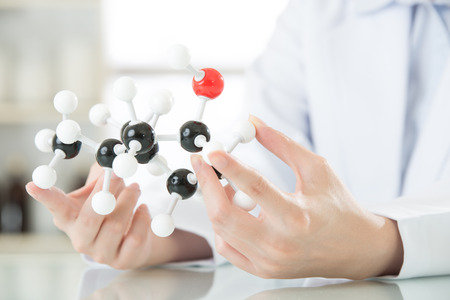 asian female scientist teacher point at molecular model explain Scientific wonders in laboratoryの写真素材