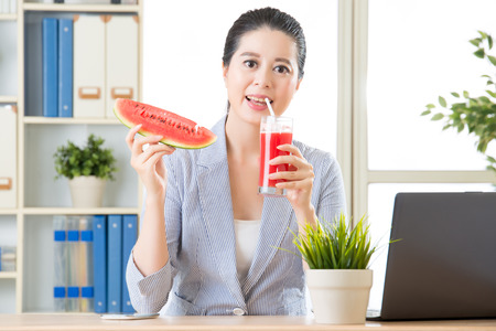 whe you drinking watermelon juice will be really enjoyment in summerの写真素材