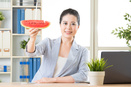 everybody eating sweet watermelon for hot summer in asia for coolingの写真素材