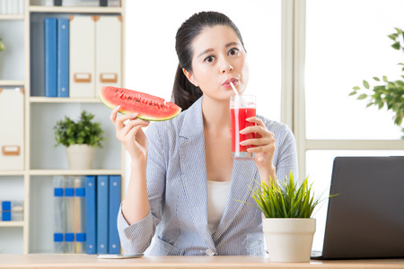 whe you drinking watermelon juice will be really cheerful in summerの写真素材