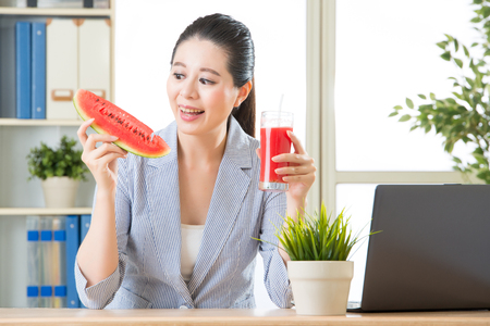 positive emotion when you see the sweet watermelon in hot temperature summerの写真素材