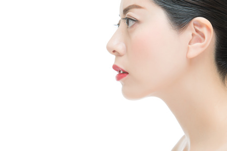 close up of beauty fashion asian girl with red lipstick, isolated on white backgroundの写真素材