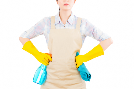confidence housewife hands Insert the waist with rubber gloves isolated on white background. Beautiful fresh energetic multiracial Chinese Asian female model.の写真素材