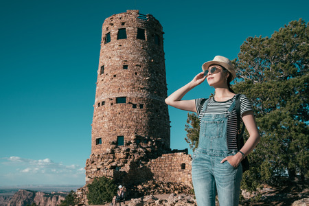 Asian woman backpacker travel vacation in usa. young girl traveler sightseeing the sand mountain...