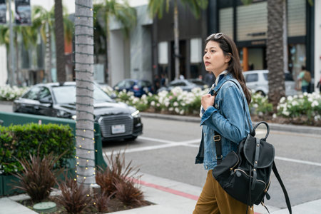 Stylish Tourist asain girl enjoying walking the city during weekend tripの写真素材