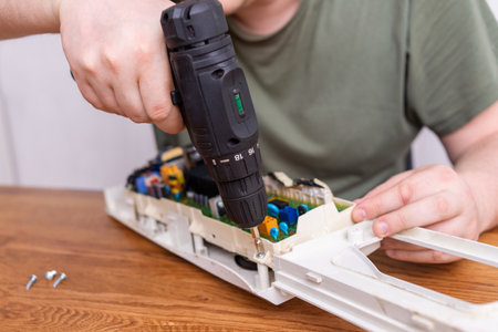 Screwdrivers. Mens repair tools. wrench. Parts of an automatic washing machine