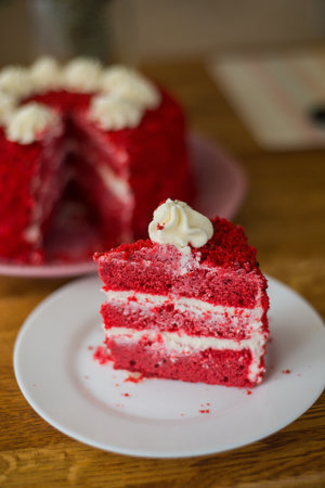 Cake Red Velvet. Appetizing biscuit cakes and white cream