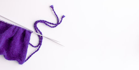 Female hobby knitting. The beginning of the process of knitting a sweater.の写真素材