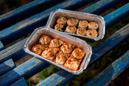 Picnic. Sushi outdoors on a summer day. Day off in the parkの写真素材