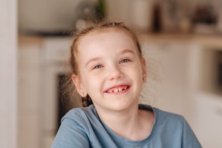 Portrait of a cute smiling girl in a homely atmosphere