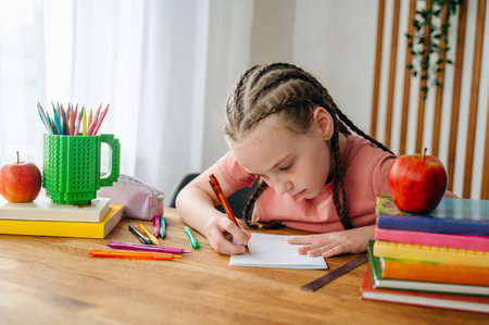 Portrait of a little schoolgirl. The concept of education and school.