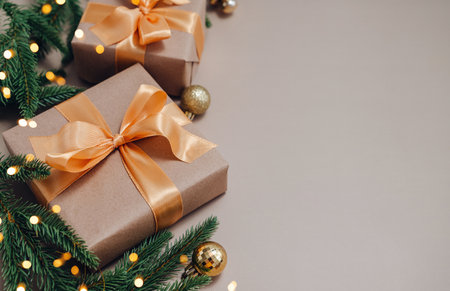 Gift box with bow and fir branches, Christmas decorations, space for textの写真素材