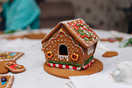 kids gingerbread house with icing and sprinkles. High quality photoの写真素材