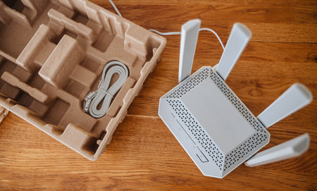 Installing Wi-Fi router at home for smart internet connection.の写真素材