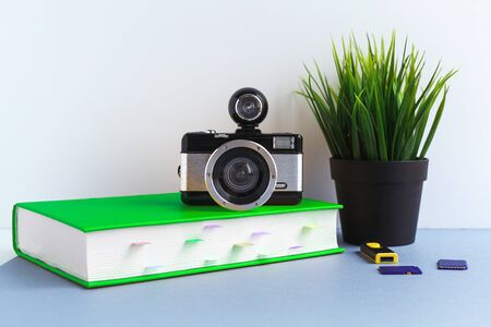 the concept of studying photography, camera and texbookの写真素材