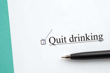 a piece of paper with the inscription quit drinking from to do list with a tick 1の写真素材