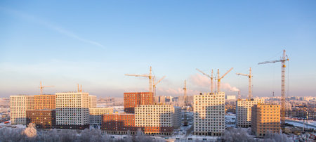 panorama of active residential mass development in Moscow in winter on a sunny cold day.の写真素材